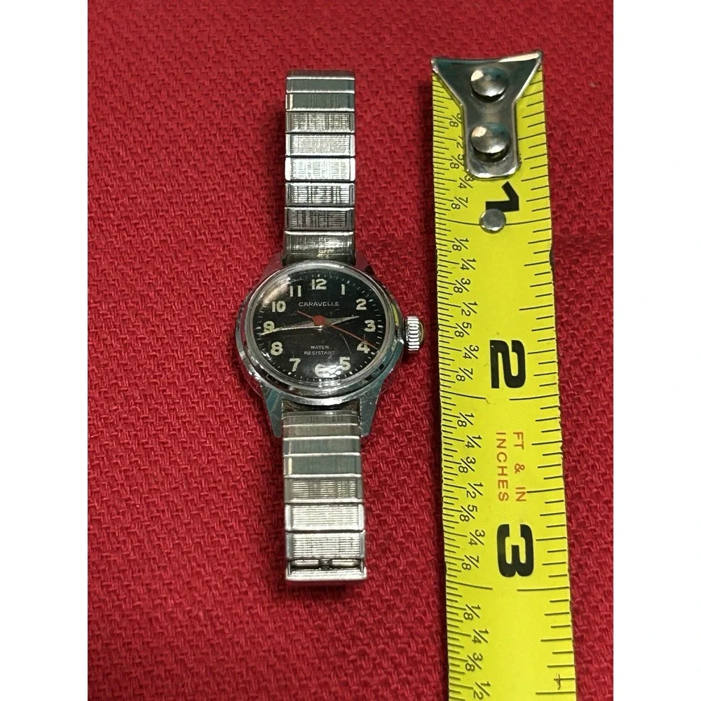 Vintage 1973 Caravelle Bulova Watch Womens Manual Wind Stretch Band READ